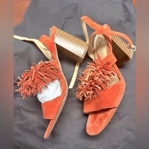 Wonder sandals. Orange gorgeous color. Pom Pom. Fun and comfy. Size 7.